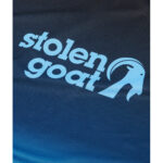 Close up of logo on Stolen Goat Zion long-sleeved mountain bike jersey navy blue to light blue gradient fade