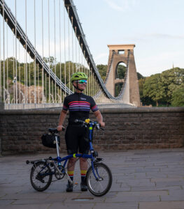 Woman standing in front of Clifton Suspension Bridge wearing Ministry jersey