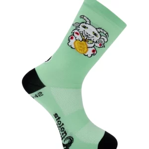 Jade green cycling socks with black heel and toe and waving goat design. Side view.